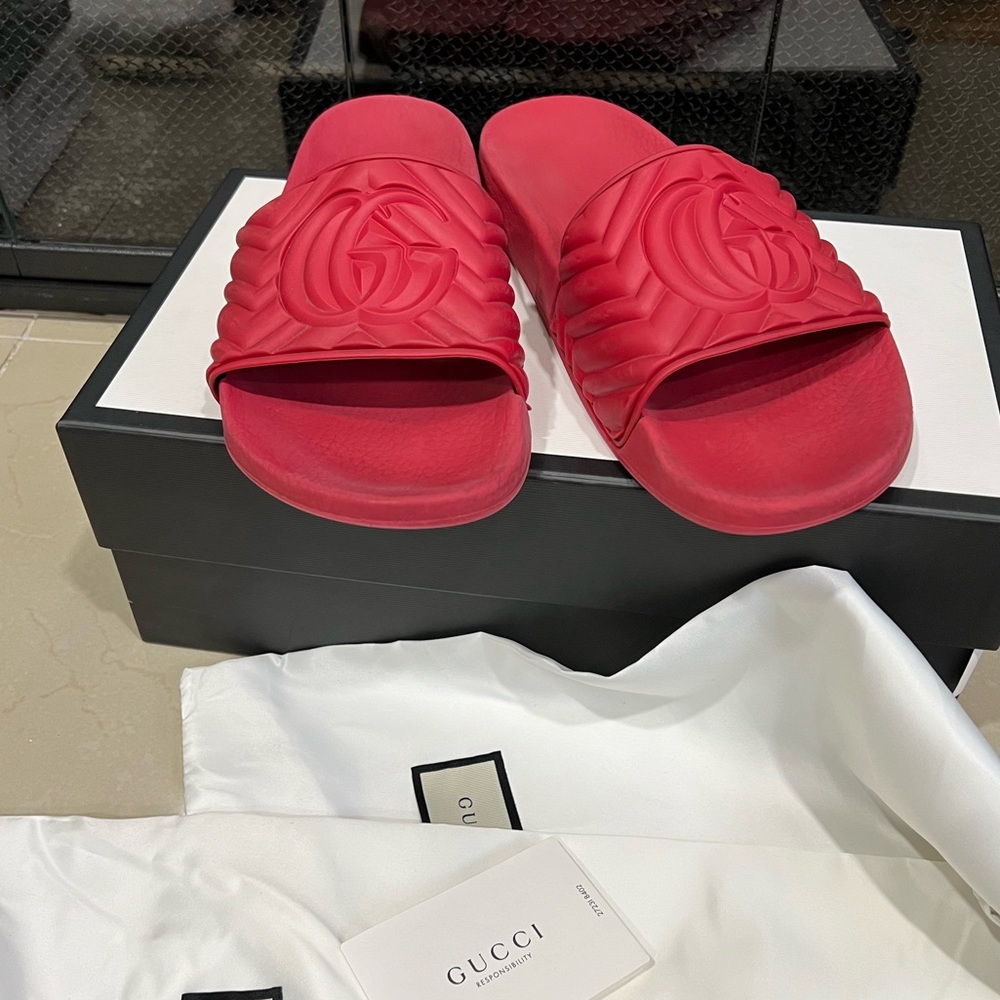 Authentic Red Gucci embossed logo slides